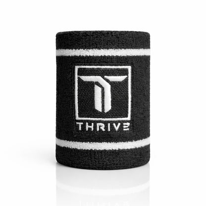 Thrive Pickleball black 4-inch athletic sweat-absorbing wristband with white embroidered logo and stripe detail.